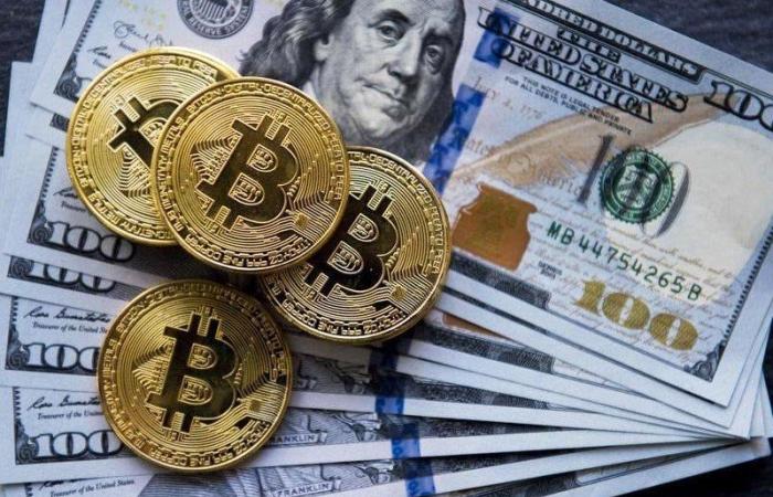 سعر بيتكوين يتجاوز 100 ألف دولار